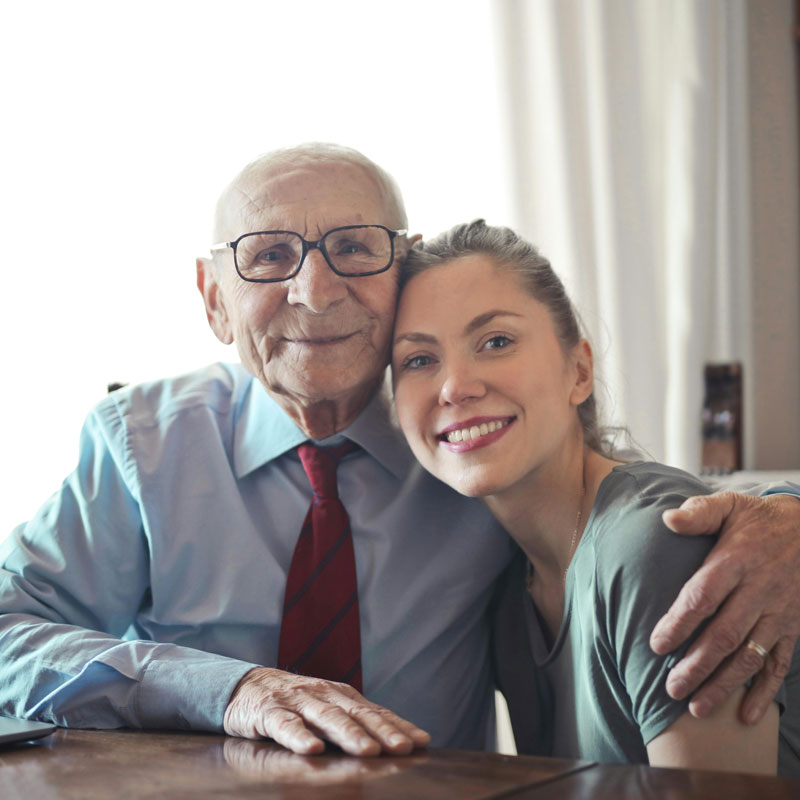 elderly man with caregiver